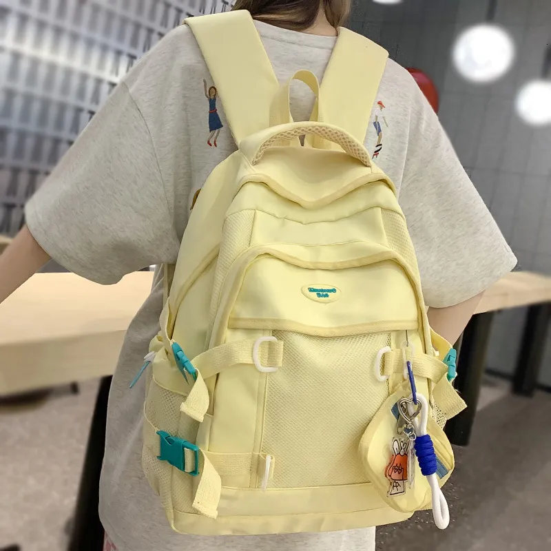 学校のバッグファッション女性イエローイエローメッシュトラベルコイン財布バックパックガールナイロンクールレディキュートラップトップネットブックバッグ230721