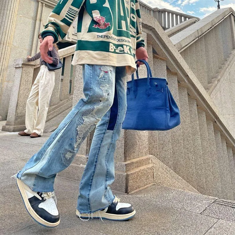 Męskie dżinsy mężczyźni szczupły koreańsko-mody plusk-kod swobodny spodni Niebieskie modne spustę