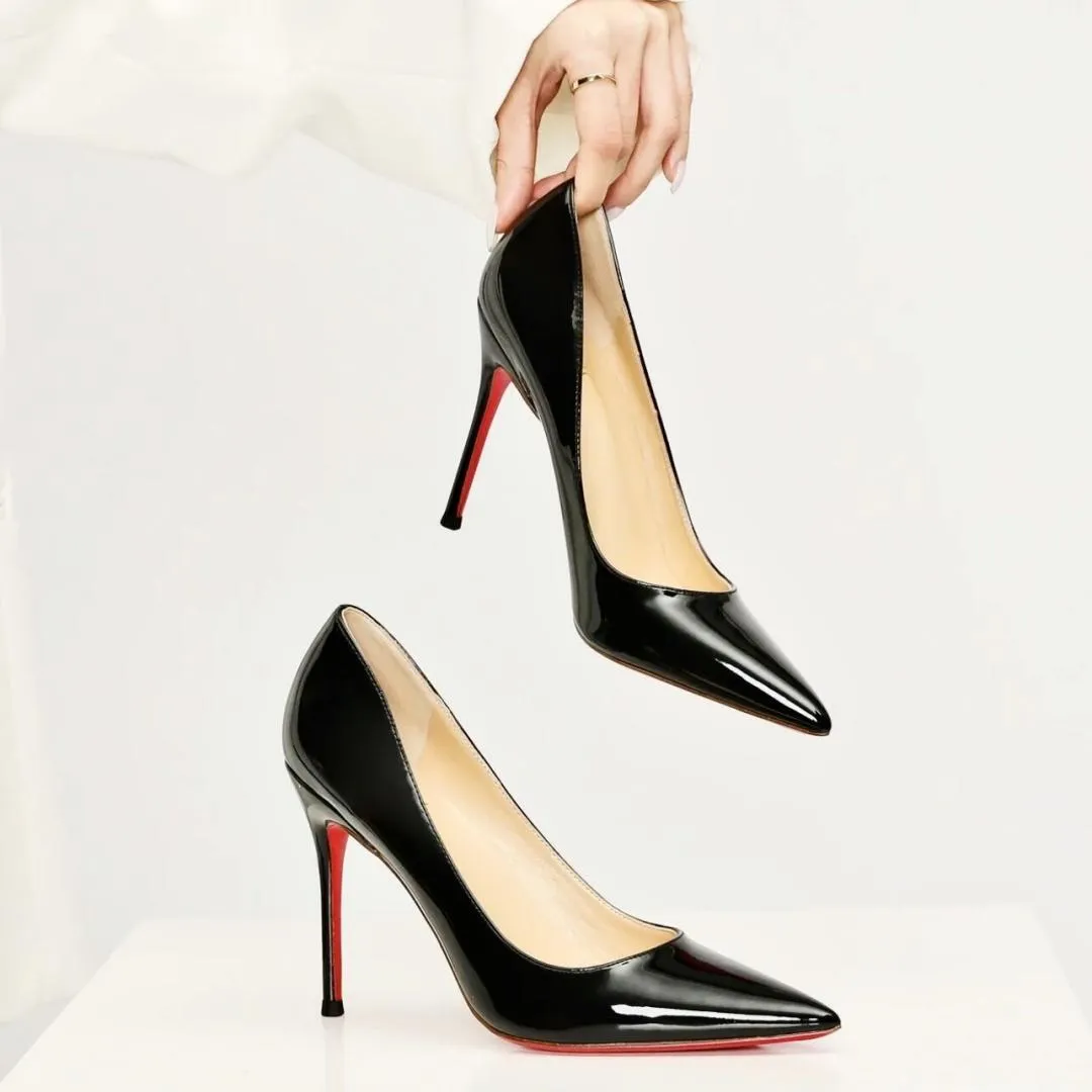Pumps nere store con tacco
