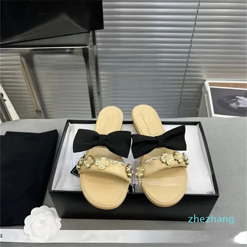 2023-Pearl Flip-flops Vrouwen 2023 Fashion Slippers Nieuwe Bow Flat Metal met Fairy Holiday Flip-flops