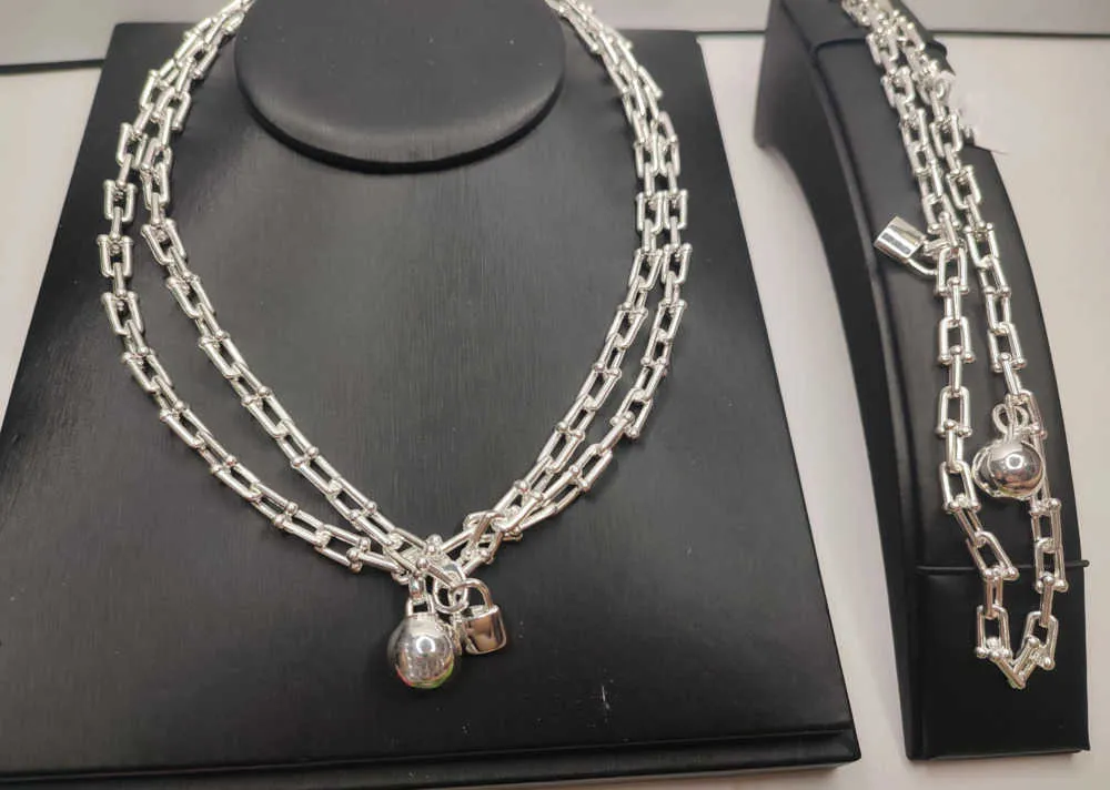 18 -karatowy srebrna bransoletka Naszyjka Zamknięcie Zamek Horware sprzęt Pierścień Moda Modna Projektant biżuterii dla kobiet mężczyzn Para bransoletki Kolki