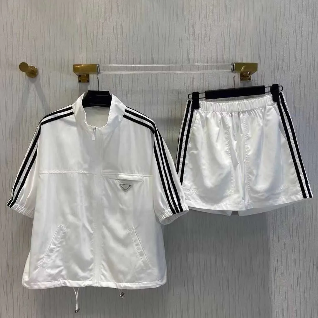 Summer women's striped stand collar short sleeve and elastic shorts set, polyester fabric is soft and comfortable, loose casual daily fashion.