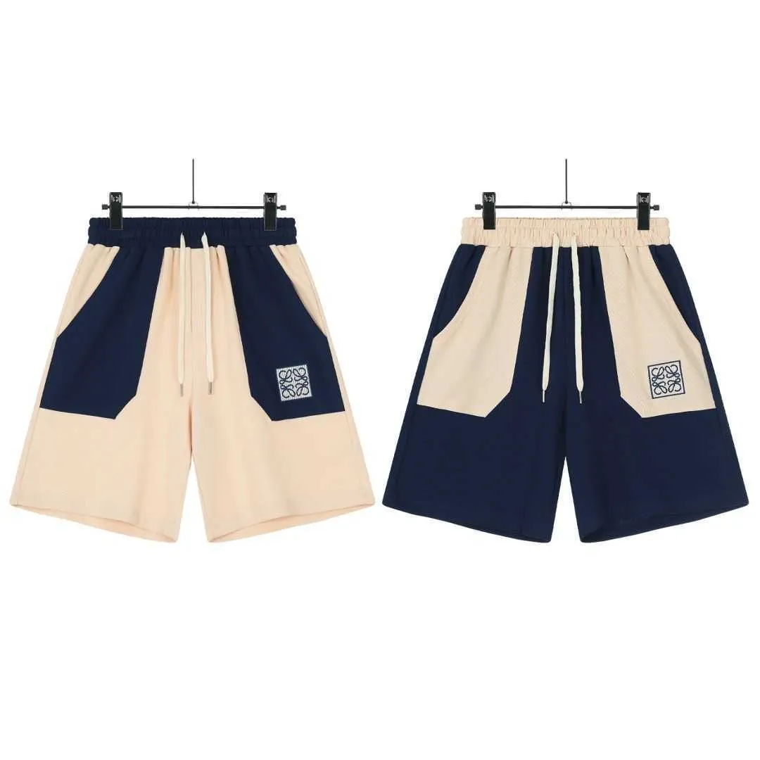 Herenshorts Nieuwe LOEWE shorts met paneelzakken en geborduurde shorts met drakenkatpaneel