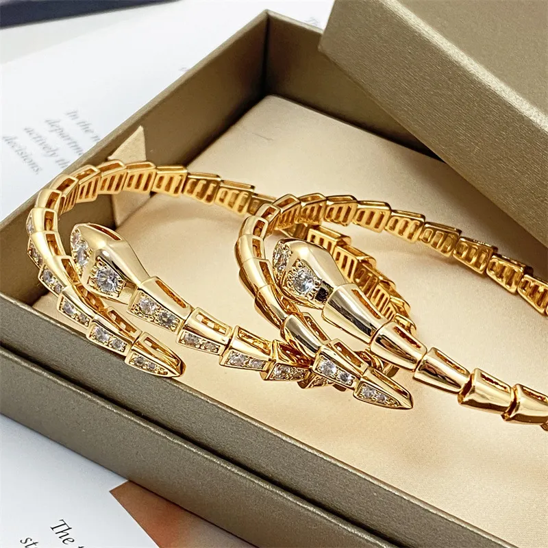 Braccialetti con ciondoli firmati per donna Bracciale in oro con serpente Bracciale con fibbia a molla in acciaio inossidabile di alta qualità Design di fidanzamento per la festa nuziale Bracciale con diamanti da uomo