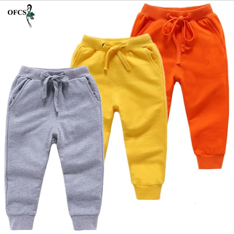 Byxor detaljhandelsförsäljning Bomullsbyxor för 2-10 år gamla Solid Boys Girls Casual Sport Pants Jogging Enfant Garcon Children Barn Byxor 230725