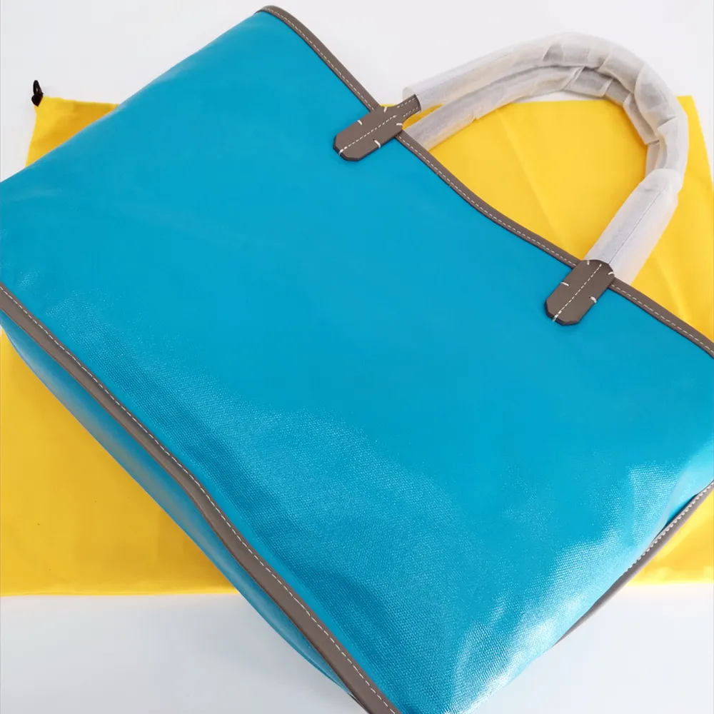 2023 جديد أزياء جديدة مصممة كبيرة حمل حقيبة سيدة Lady Luxury Handbag Beach Bag Bag Pounds Canvas مع تقليم جلدي حقيقي ومقبض