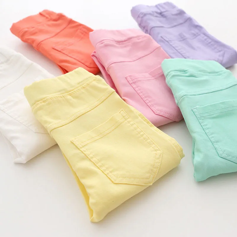 Брюки высококачественные весенние лето мод детей детские конфеты цветные карандаш для девочек штаны 230725