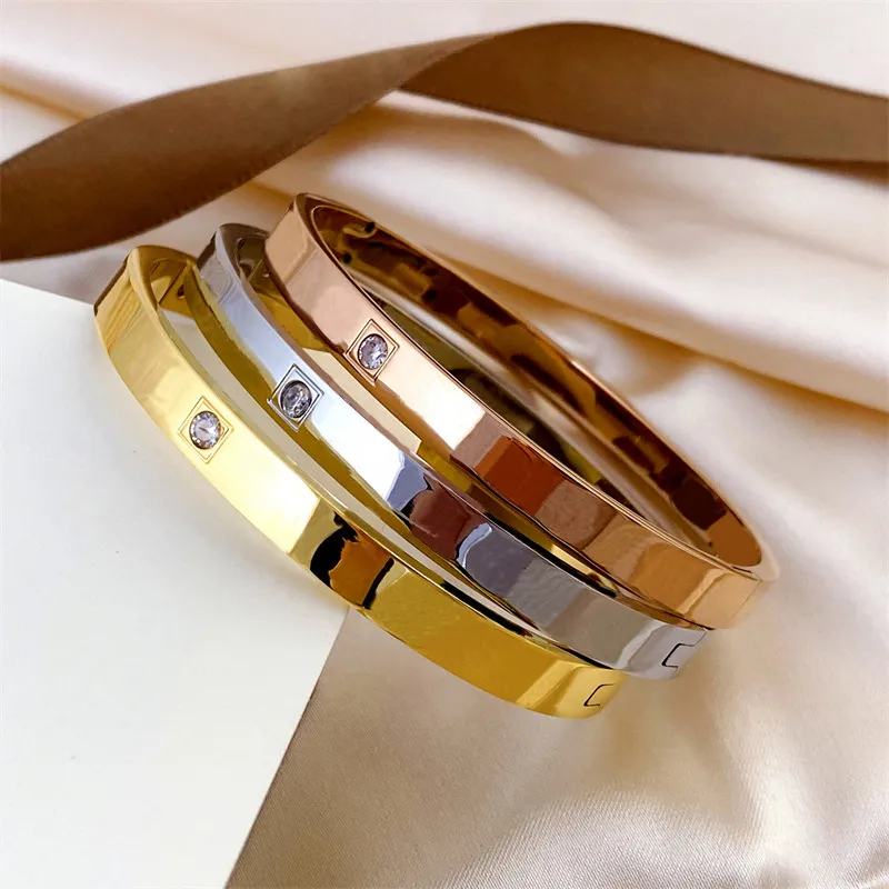 gouden armbanden merk bangle designer sieraden dames heren bedel luxe titanium staal lichtecht en niet allergisch zilver roségoud slangvormig diamanten armbandontwerp