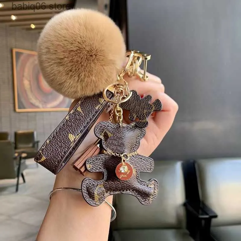 Designer pom hotsell pom keychain