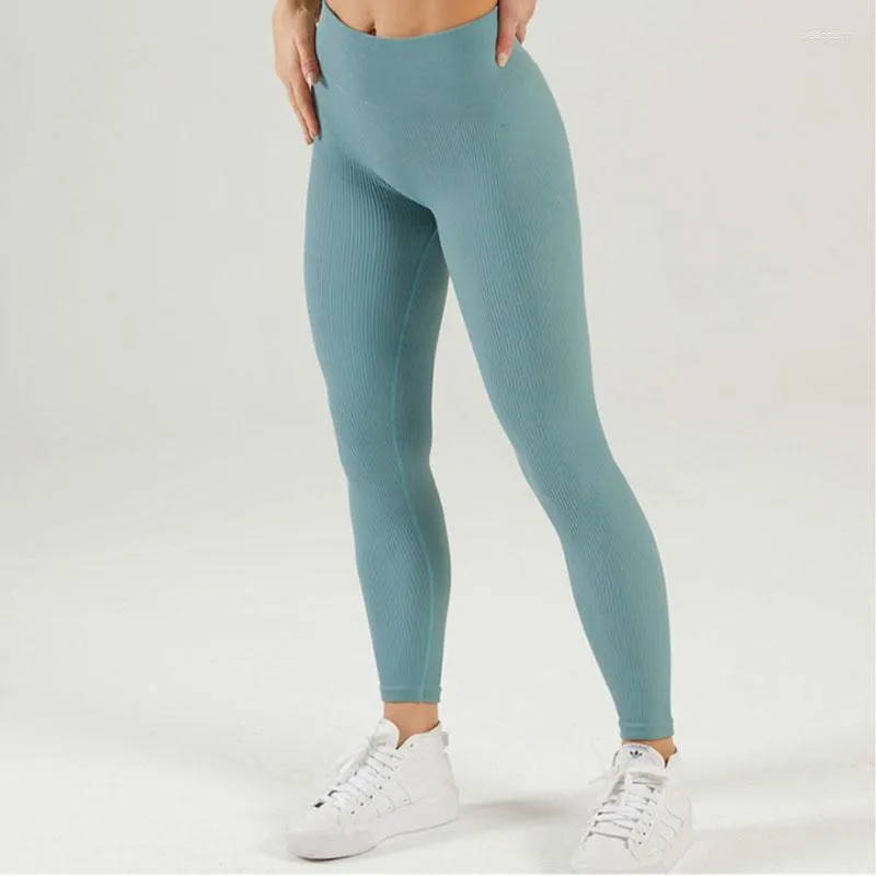 Kvinnors leggings 2023 Ribbed Yoga Sports Tights Kvinnor Sömlösa stickade byxor White Femme Gym Skinny Workout Fitness Push Up