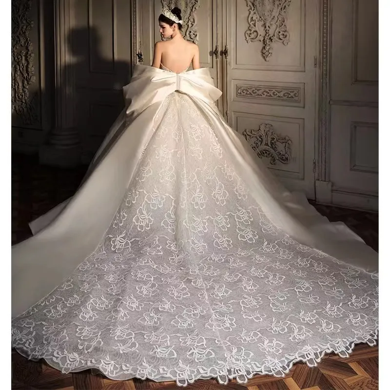 Strapless Lace Mermaid Wedding Dresses With Huge Bow Train, Lovely Wedding Dresses With Pearls, Unique Wedding Dresses Strapless Lace Mermaid Wedding Dresses With Huge Bow Train, Lovely Wedding Dresses With Pearls, Unique Wedding Dresses