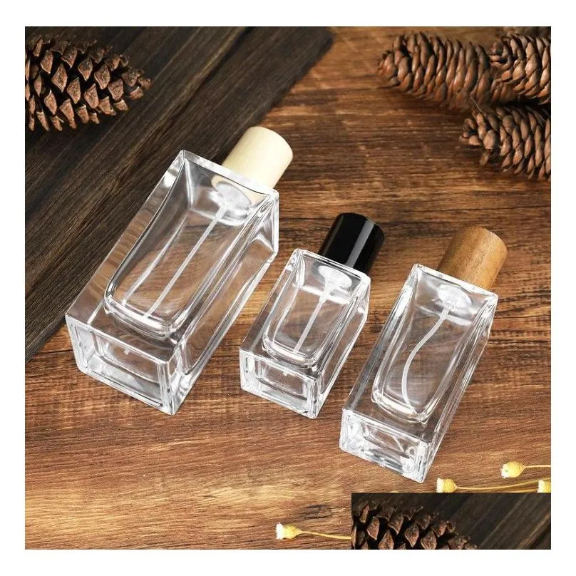 Bouteilles de parfum Vaporisateur en verre de forme carrée par 30Ml 50Ml 100Ml Bouteille vide rechargeable Drop Delivery Office School Business Industrial Ot2Yf