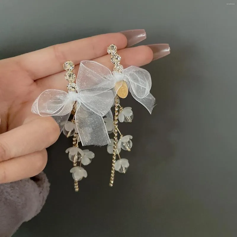 Boucles d'oreilles pendantes coréennes 2023 fée en mousseline de soie tissu nœud papillon acrylique fleur gland pour les femmes mode bijoux boucles d'oreilles en gros