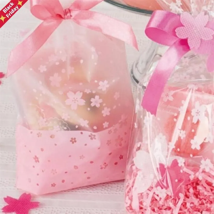 100pcs 16x26cm pembe kiraz çiçeği baskı şeffaf hediye ambalaj çantaları şeker ve tatlılar için plastik torba Noel wrap2089