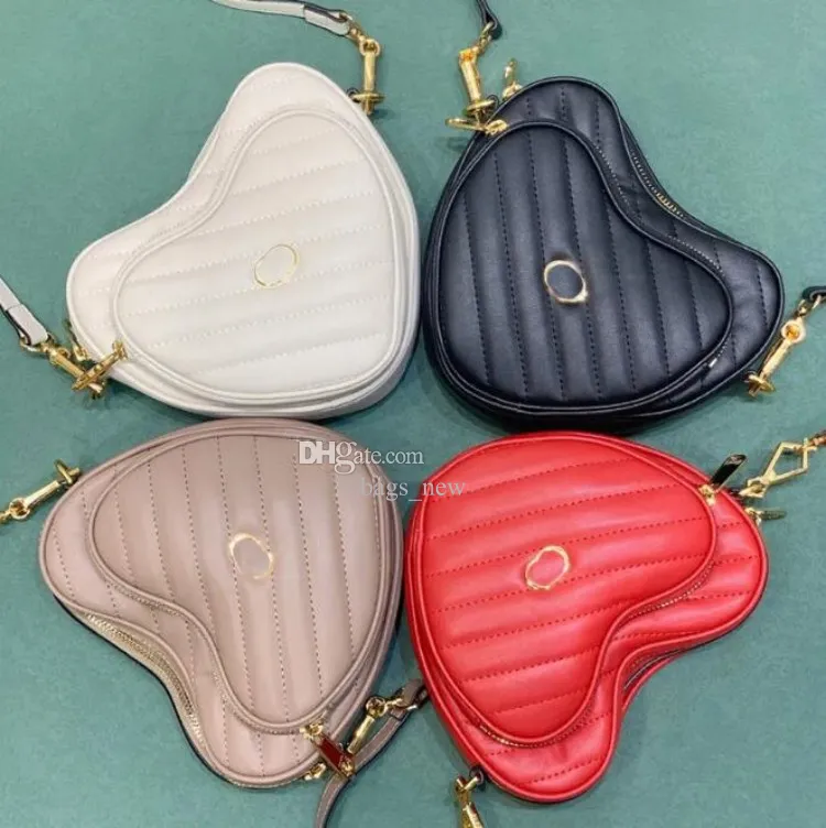 Genuine Cowhide Heart Shape Mini Bag – Chic Urban Crossbody & Handheld Leather Tote main image 0
