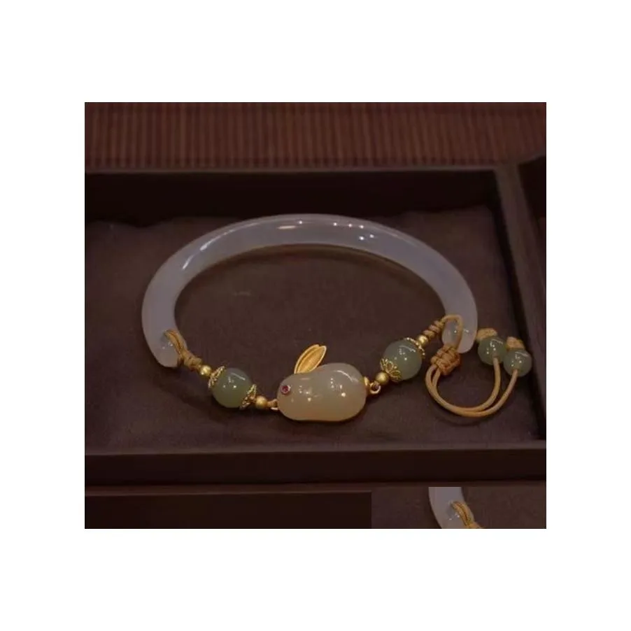 Autres accessoires de mode Changan Lock Bracelet en agate rouge naturelle Jade Calcédoine Pendentif de sécurité Rabbit Spring Festival Drop Delivery Otygt