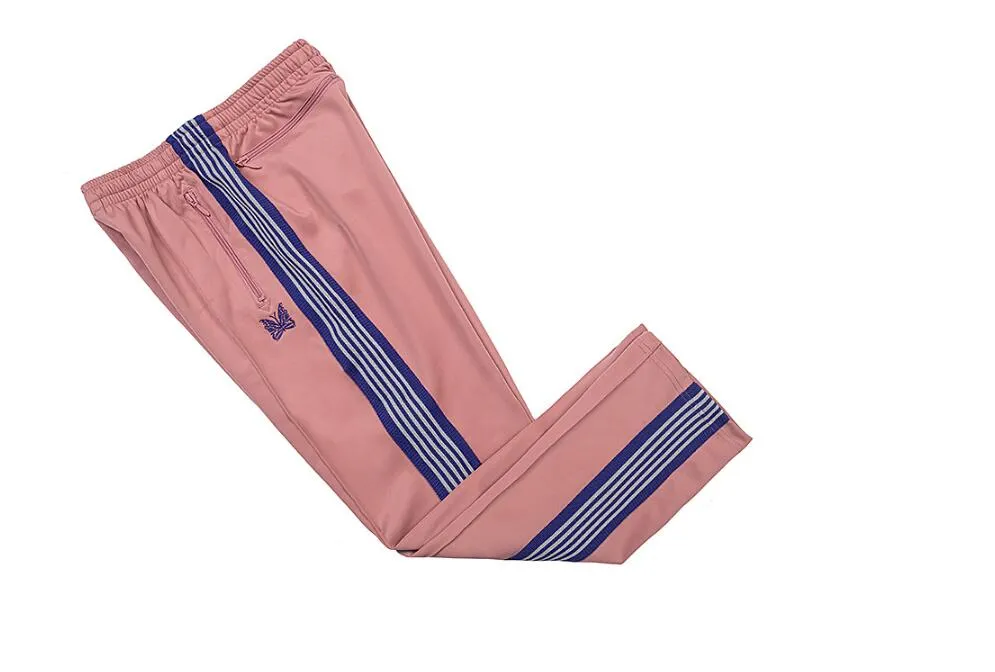 Pantalons d'aiguilles Awge d'automne printemps Pantalons rocheux Men Femmes Hip Hop Hop Quality Butterfly Piste de survêtement