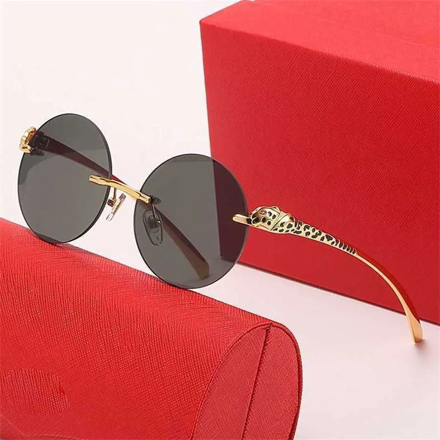 50% OFF Wholesale of New frameless retro round for men and women leopard head painted mirror legs personalized sunglasses trendy glasses 9593