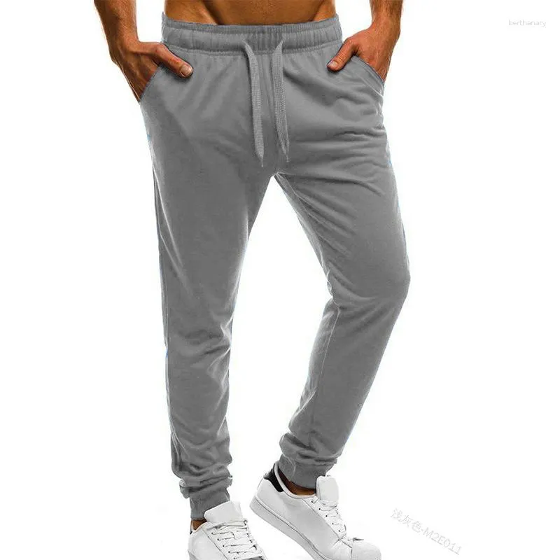 Pantaloni da uomo Primavera Estate Vita alta Tinta unita Coulisse Pantaloni sportivi da tasca skinny alla moda casual