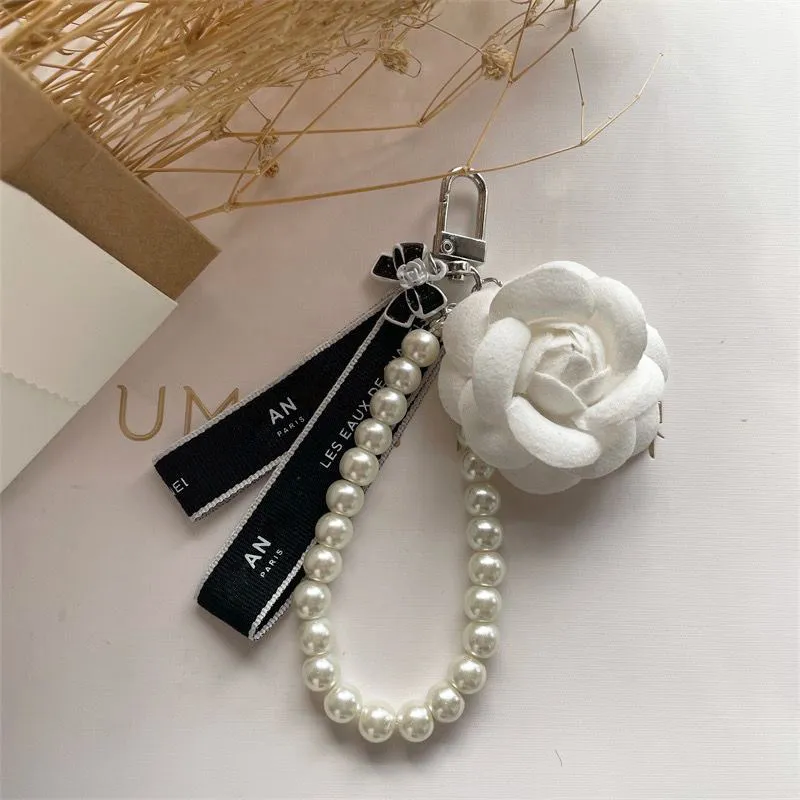 Channel Keychain Designer Keychain Luxury Bag Charm Fashion Trend Car Keyring Flower Pearl Keychain Högkvalitativ Giveaway Gift Nice Chanels