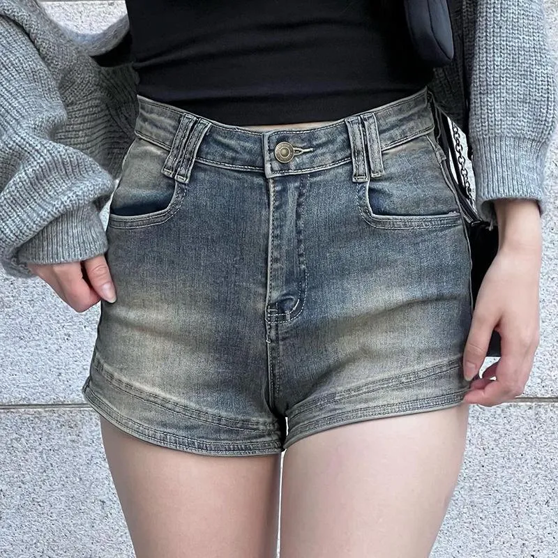 Женские шорты продают синюю джинсовую ткань в стиле моды на 2023 г. Летняя пряная девушка с высокой талией с плотной дном широкой ноги