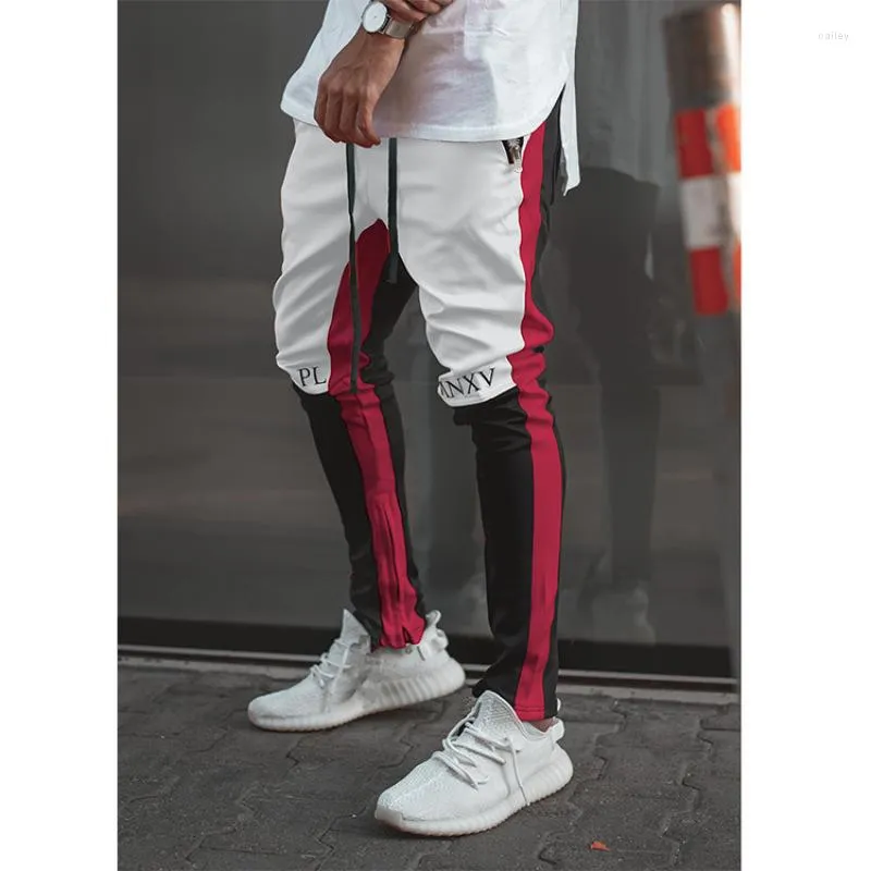 Pantaloni da uomo Pantaloni da jogging con impiombatura a colori a contrasto Pantaloni della tuta Pantaloni sportivi da bodybuilding attillati stampati con lettere in cotone