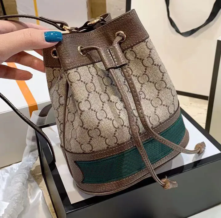 Bolso de diseñador de lujo de alta calidad 10A Moda para mujer CrossBody Lienzo Impreso Bolso para mujer Bolso de hombro monedero 2024 Mini cubo Carteras cruzadas Bolsos