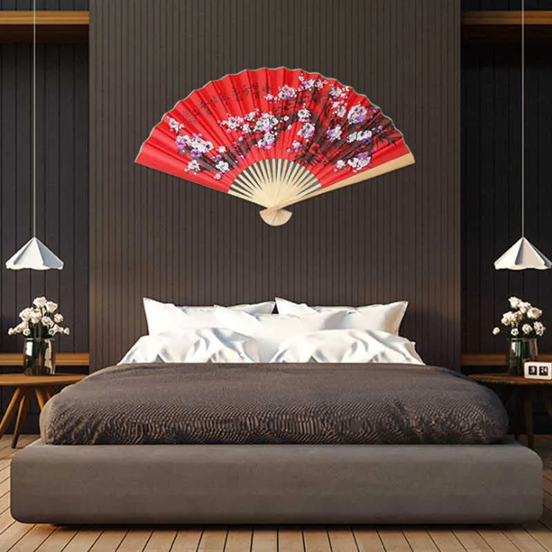 Produtos de estilo chinês 50cm estilo chinês grande ventilador dobrável vermelho usado para decoração de parede de casamento família sala de estar plano de fundo ventilador de papel série artesanal