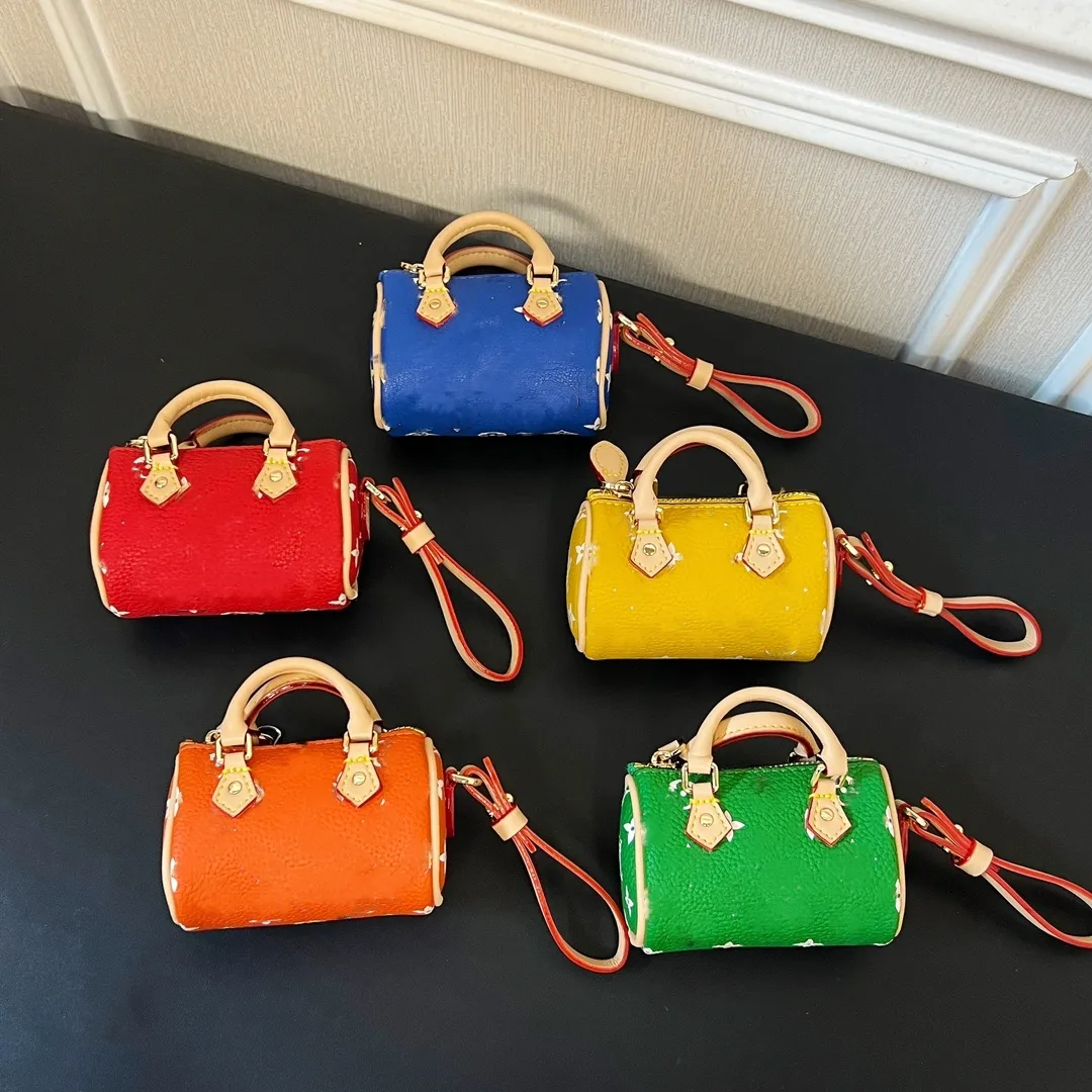 Bolsos limitados Mujeres Monederos MINI KEEPALL Bolsos Llavero Carta Cuadrícula Graffiti Carteras Bolsos de embrague Monedero Llavero Bolsos Totes Charms Llavero Mini almohada Bolso colgante