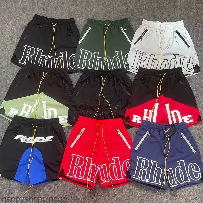 Designers Rhude Shorts Mens Basquete Calças curtas 2023 Luxurys verão letra de palmeira de praia Mesh Street Fashion Sortpants Lulusup