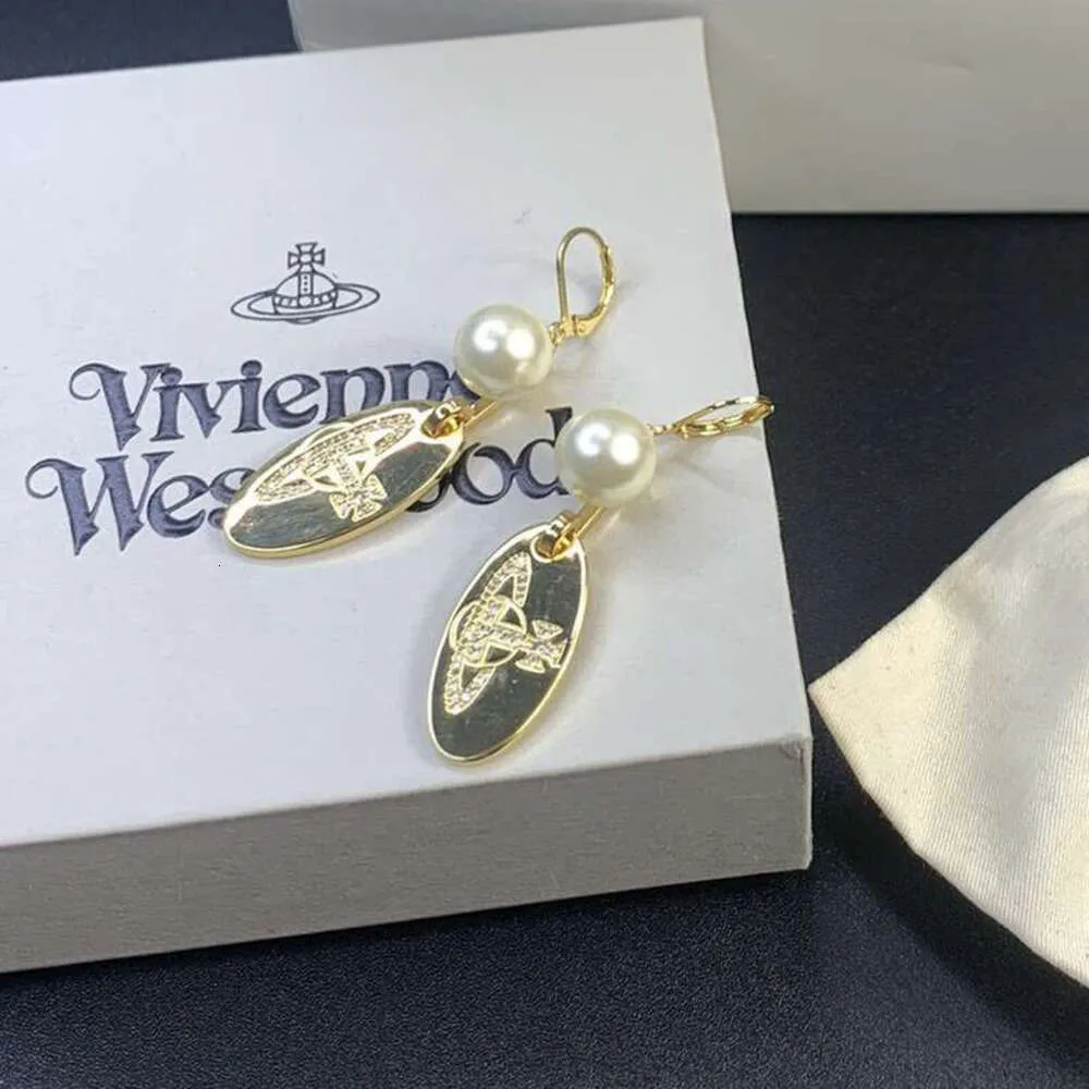 Designer Viviane viviennes westwood New Western Empress Dowager Pearl Oval Saturn Earrings Women's Light Luxury Simple Long French Earrings