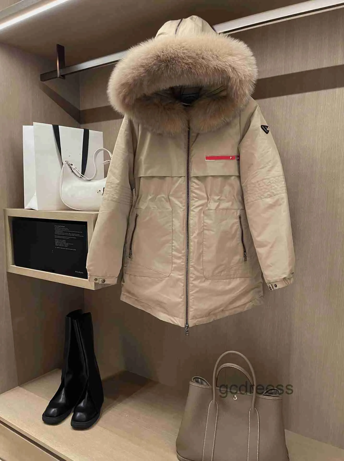 2023トップデザイナーの女性のダウンジャケットトップブランド女性のパーカー冬濃厚な暖かい長いコートカップルの白いガチョウダウンメンズフード付きジャケット