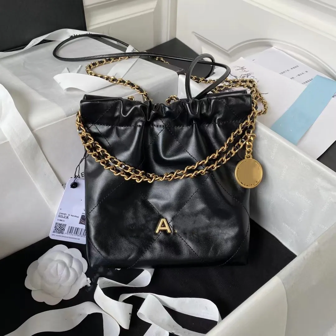 2023 Nieuwe designer tas 100 schapenvacht klassieke zwarte mini vuilniszak metalen ketting zwarte tassen gele handtas schoudertassen mode Tassen tote