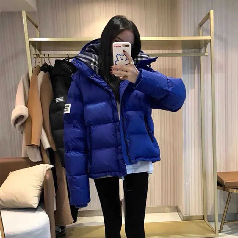 Zhou Dongyu 같은 분리 가능한 다운 재킷 여자의 겨울 새로운 두꺼운 빵 재킷 스키 재킷을 가진 유명인