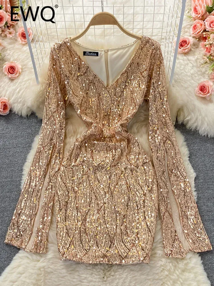 Grundläggande avslappnade klänningar EWQ Sweet Style Sequin Patchwork Långärmad fast färg A Line Sexig Women s Hip Warp Dress 2023 Autumn 27SN3412 231101