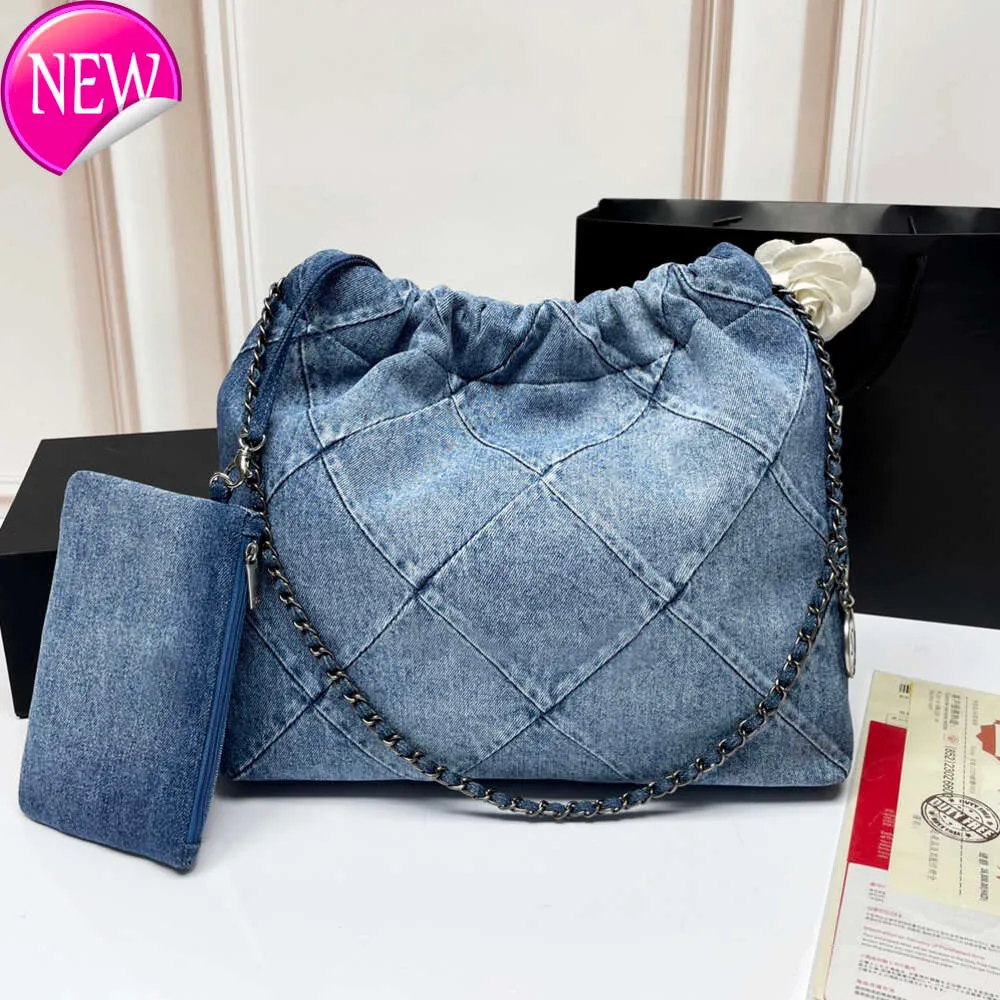 Kanal 22 denim Grand Shopping Bag Tote Travel Designer Kvinna Sling Body dyraste handväska med Sier -kedjan Gabrielle quiltad 552G