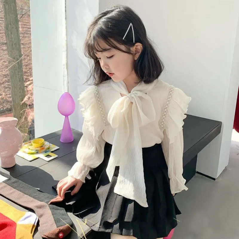 Koszule dla dzieci w stylu koreańsko -koreańskie dziewczynki eleganckie bluzki wiosna maluch dzieci topy marszki długie rękawy koszule dla dzieci 230331