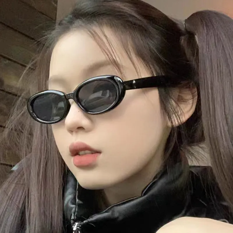 Fashion designer sunglasses Women's high sense fashion oval small frame retro Spice street photo shade UV sunglasses