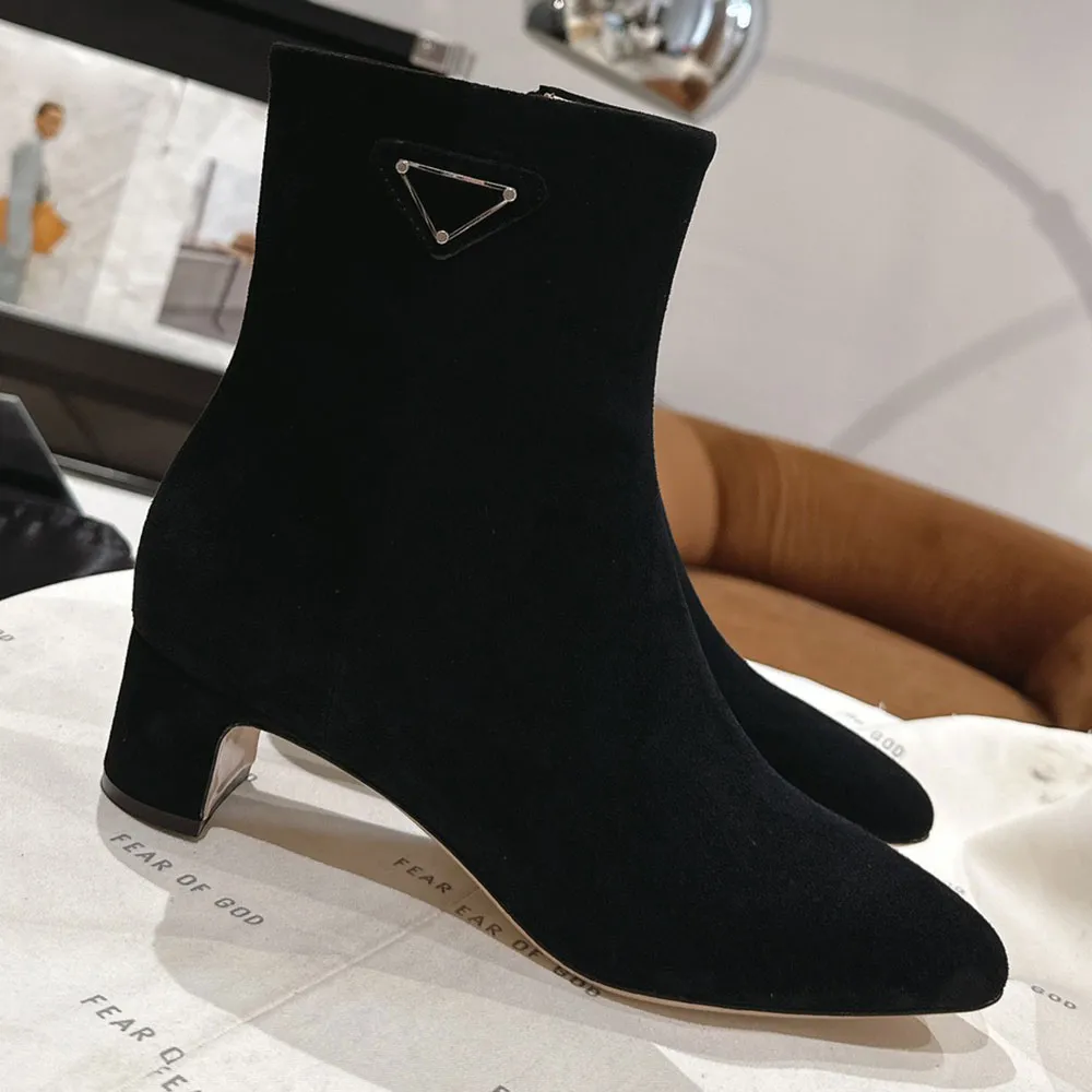 Leather booties 1T192N with side zipper and leather lining have a sleek design iconic triangle logo designed by Mari ladies boots ing star same model Large size 35 42