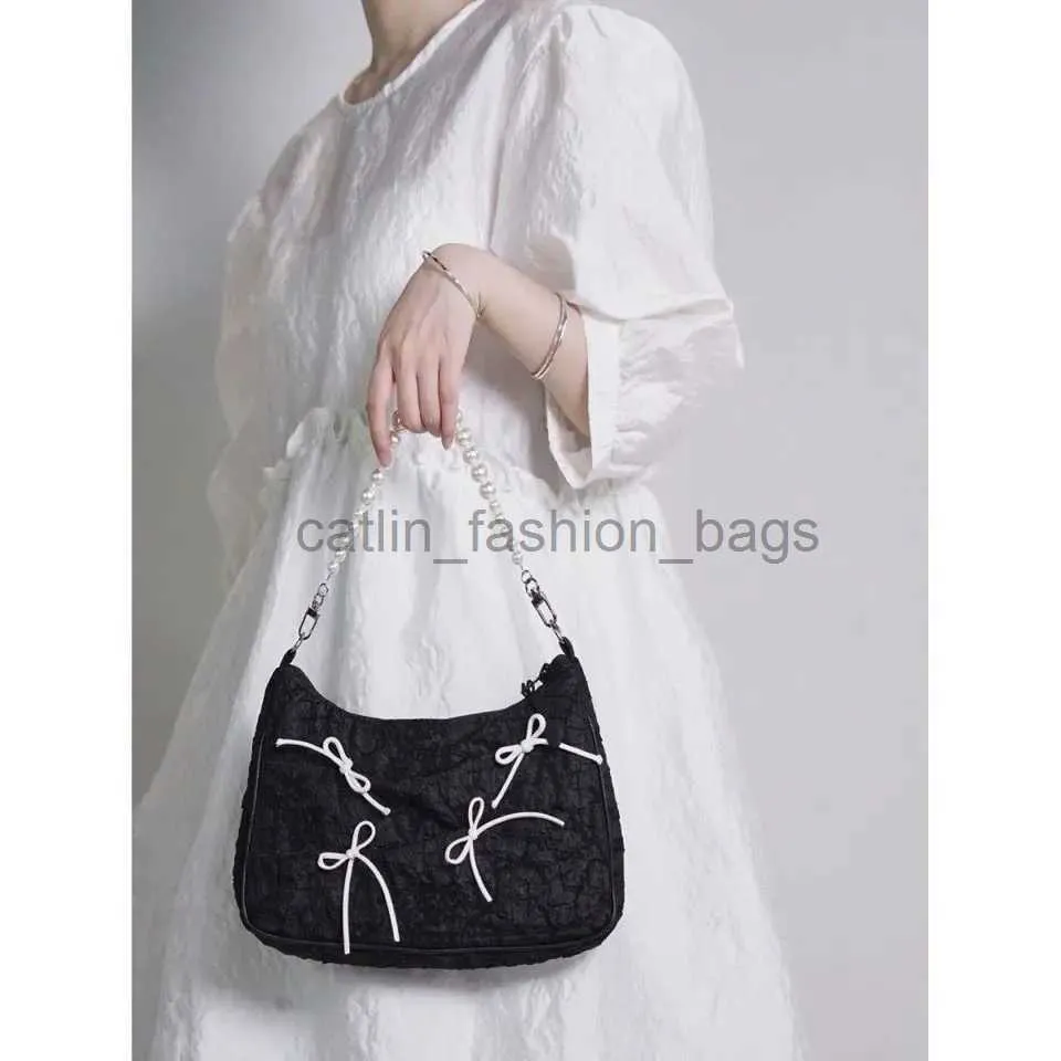 ショルダーバッグガールズバッグナイロンバケツデカールソリッドジッパーソフトバッグファッションウォレット女性バッグキャットリン_fashion_bags