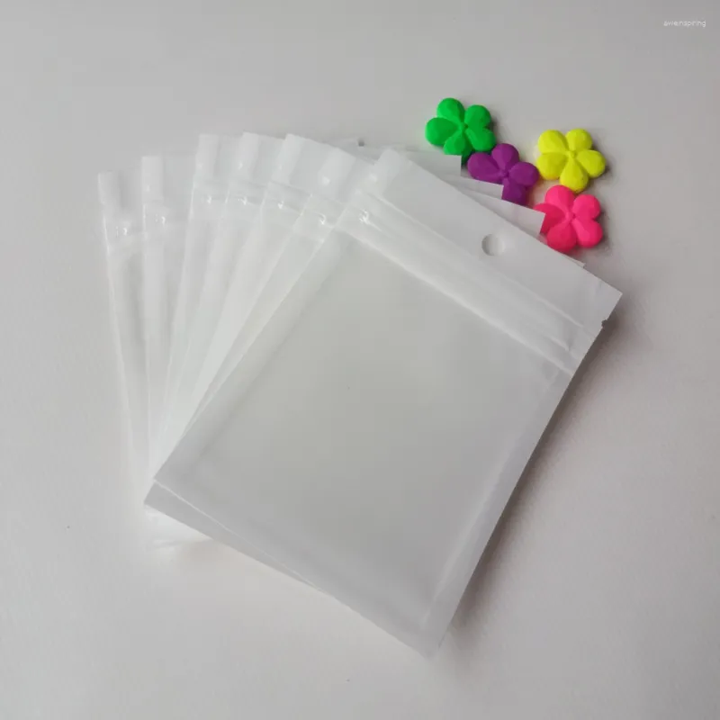 Sacchetti per gioielli 1000 pezzi 6 10 cm Bianco / Trasparente Imballaggio in plastica con cerniera automatica Poli sacchetto di pellicola di perle Sacchetti a chiusura lampo Pacchetto con foro per appendere