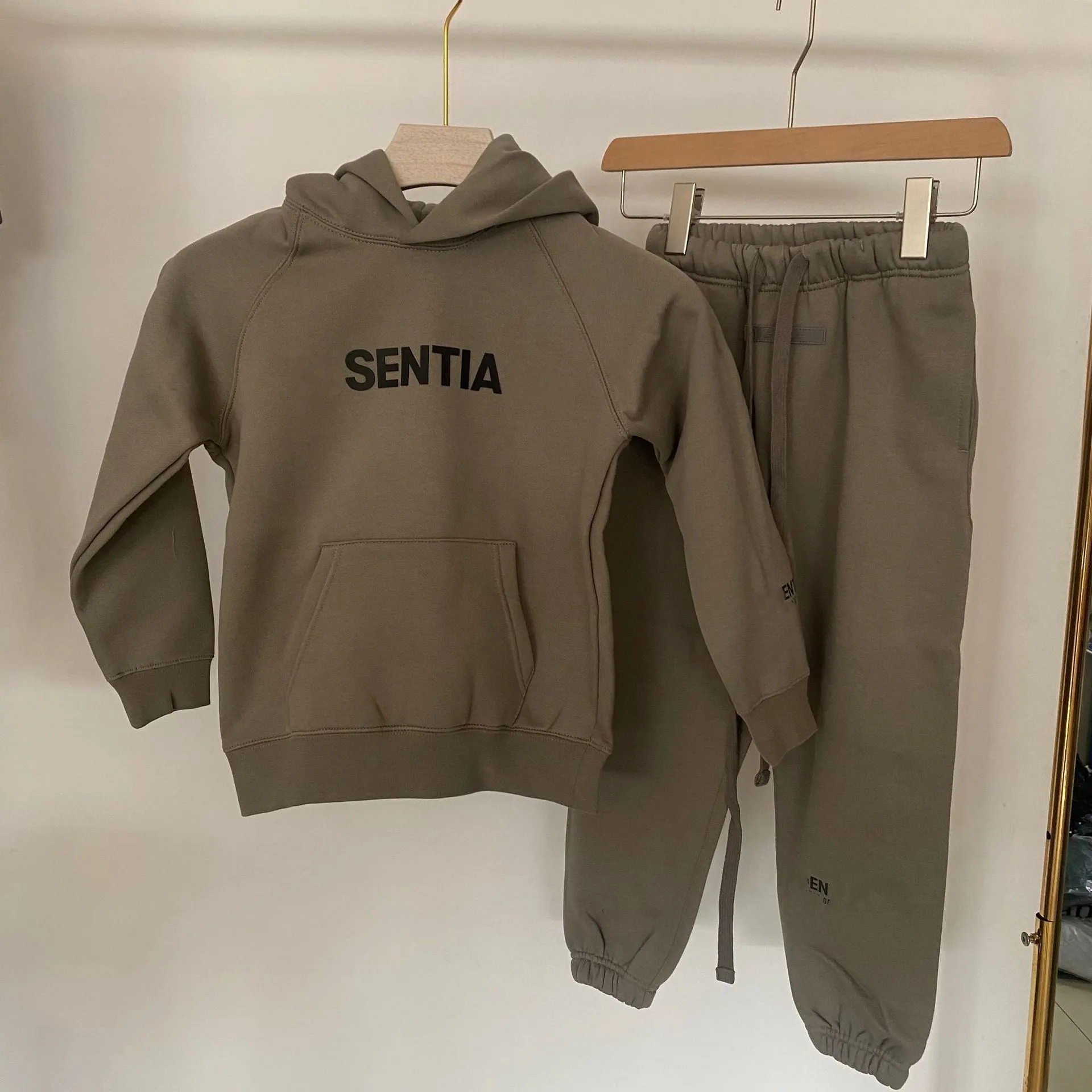 Essentials store camel hoodie