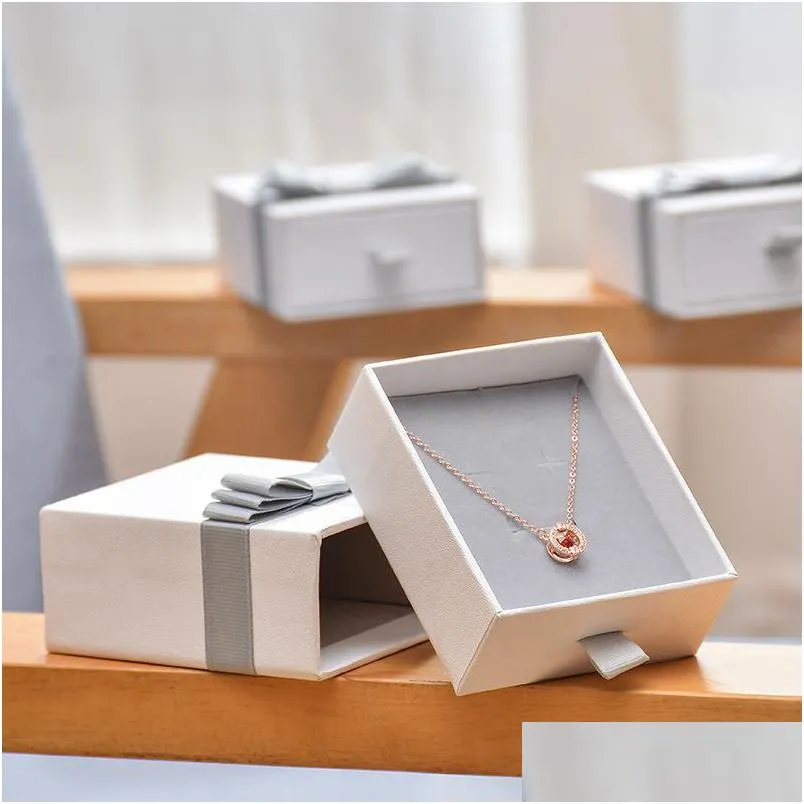 Jewelry Stand 12 Pieces/Lot High Quality Kraft Paper White For Ring Earrings Necklace Bracelet Packaging Storage Gift Box Dr Dhgarden Dhcmk