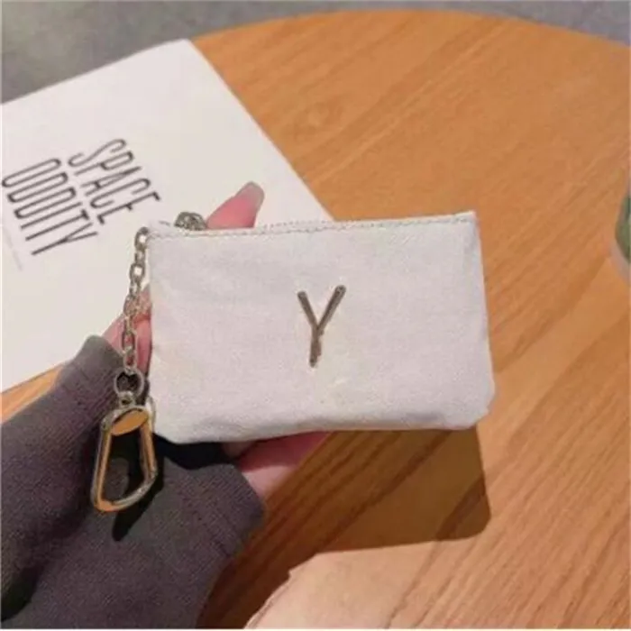 Diseñador Hombres Mujeres Monedero Moda Letras de lujo Cremallera de cuero Llavero Bolsa Mini Carteras Titulares de tarjetas