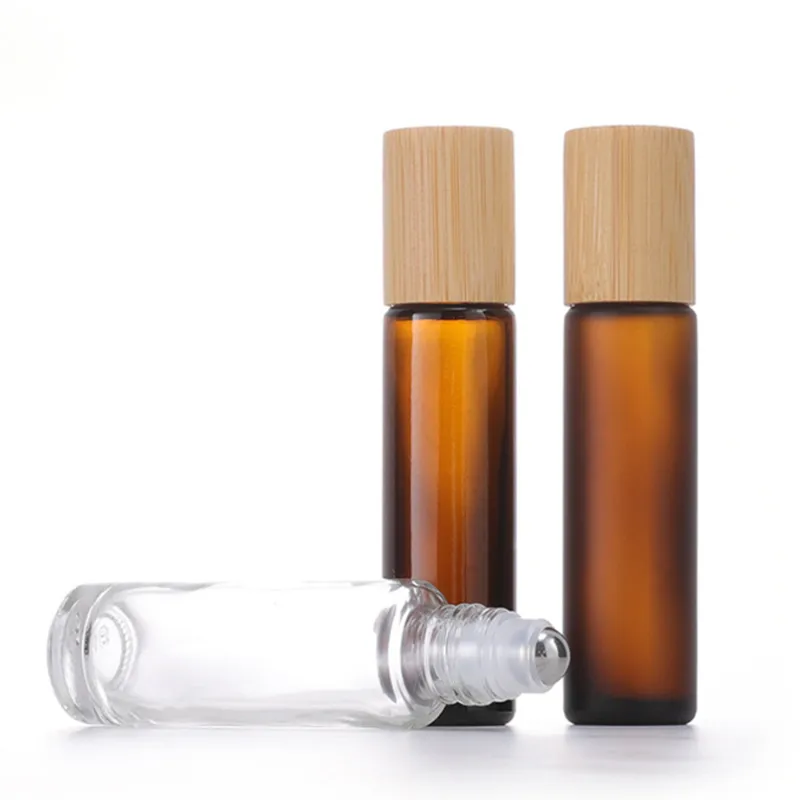 1/2 oz rolo de vidro cosmético de vidro em garrafas âmbar embalagem de perfume fosco transparente com bola de metal e tampa de bambu