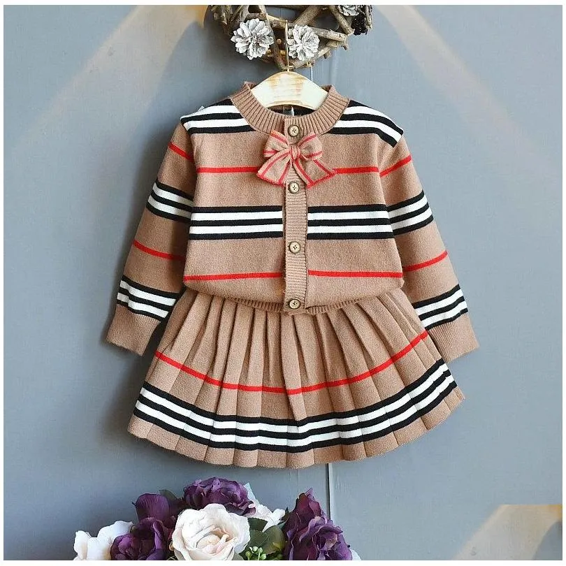 Conjuntos de ropa Baby Girls Ropa de invierno Conjunto Suéter de niña Falda plisada a rayas Traje de dos piezas 3-7 años Ropa para niños Entrega de gotas Ba Dhysj