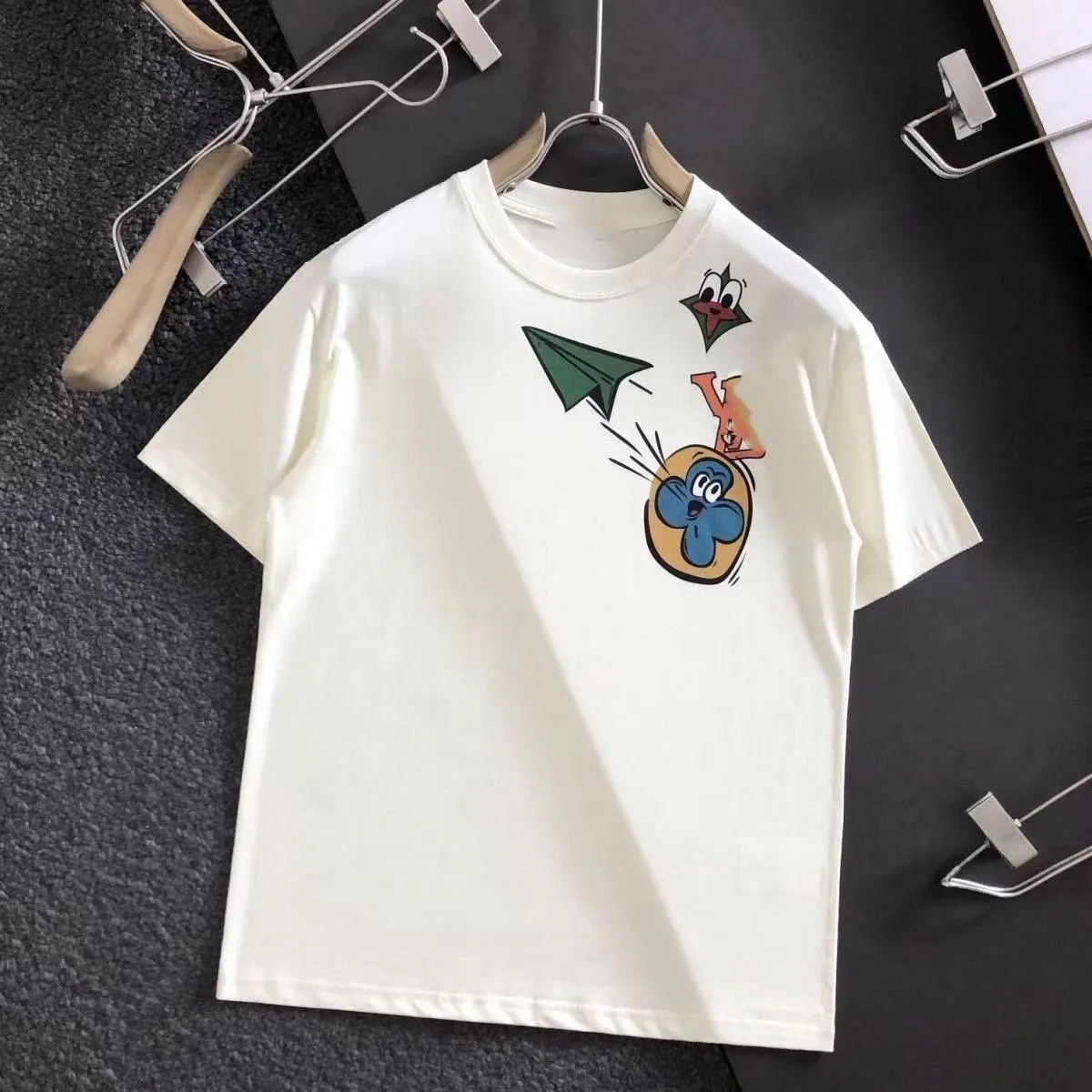 Designer L mans luxe T-shirt merk t-shirt Kleding spray letter korte mouw lente zomer tij mannen en vrouwen tee designer t Pure kleur ademend Luxe T-shirt