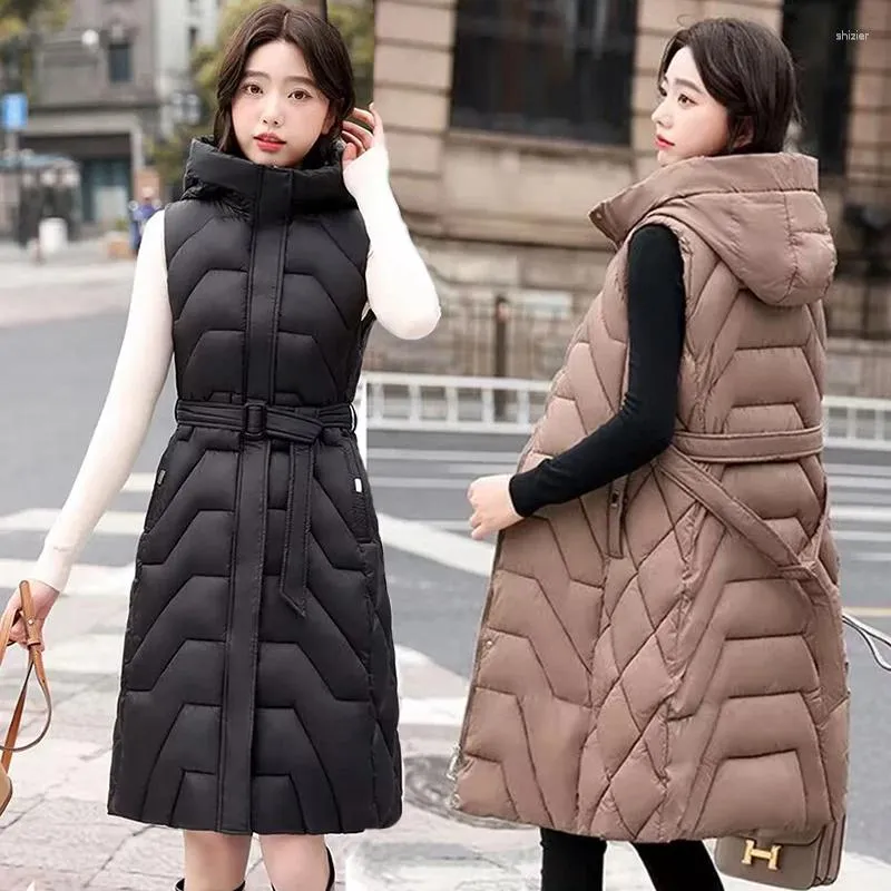 Kvinnors västar väst lång bälte kappa vinterkvinna puffer 2024 koreansk mode huva utkläder kvinnlig ärmlös jacka