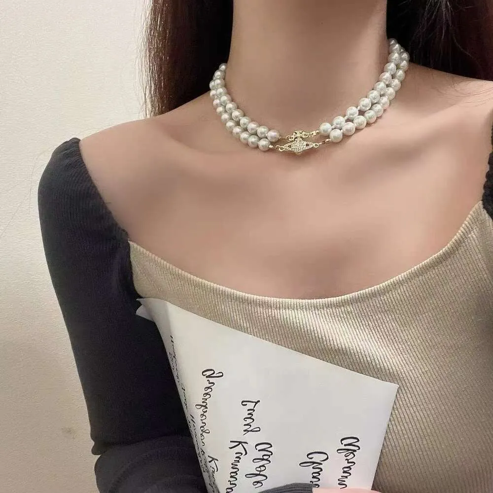 Desginer vivienenn Westwoods Empress Dowager Saturn Full Diamond Magnetic Buckle Double Layer Pearl Necklace Womens High Sense Planet Pearl Neckchain Co