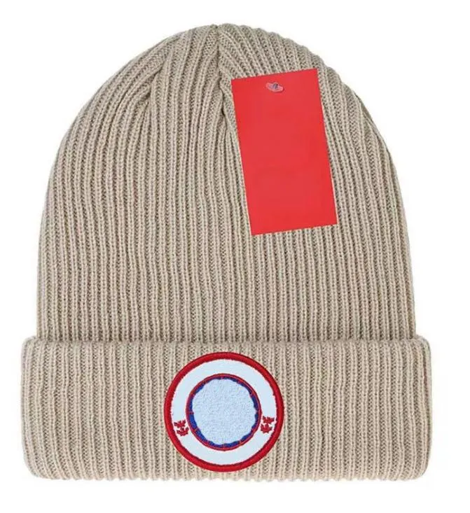 暖かい冬の帽子のデザイナービーニーウールニットカナダのレディースビーニーキャップカシミア織り